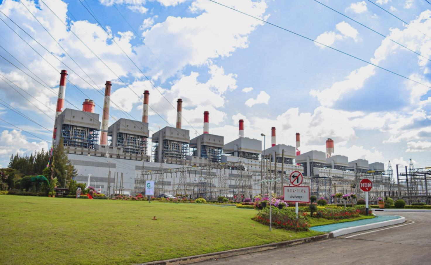 Bioenergy research facility with solar panels and biomass processing equipment
